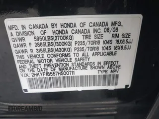 2007 Honda Pilot EX-L with VIN 2HKYF18557H500711, listed as a IAAI auction lot 41794731 with 168,553 mi miles. Bid and sale history available at carsss.com. Image 9.