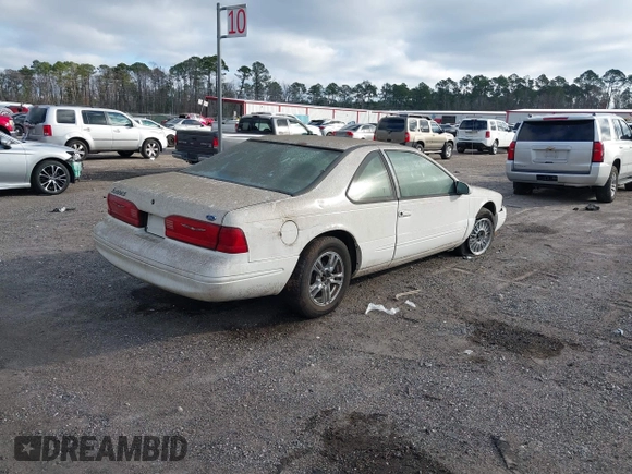 1996 Ford Thunderbird LX z VIN 1FALP62W4TH154400, wystawiony jako IAAI lot #41394723 z przebiegiem 65 860 mil mil oraz . Historia ofert i sprzedaży dostępna na DreamBid. Obrazek 4.