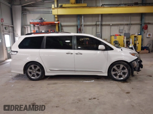 2014 Toyota Sienna SE with VIN 5TDXK3DC7ES497390, listed as a IAAI auction lot 42037096 with 169,127 mi miles and . Bid and sale history available at DreamBid. Image 14.