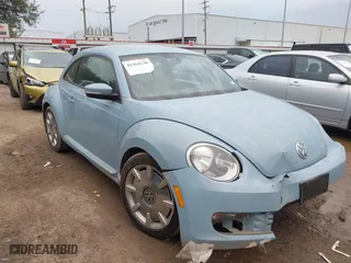 2012 Volkswagen Beetle 2.5L PZEV with VIN 3VWJP7AT0CM624851, listed as a IAAI auction lot 41364230 with 1 mi miles. Bid and sale history available at carsss.com. Image 1.