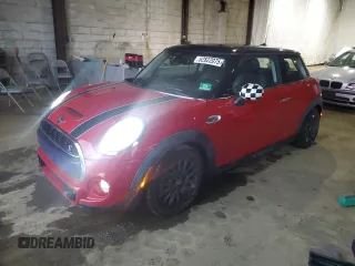 2014 MINI Hardtop S with VIN WMWXM7C54ET986641, listed as a Copart auction lot 62822075 with 80,904 mi miles and Salvage title. Bid and sale history available at DreamBid. Image 1.