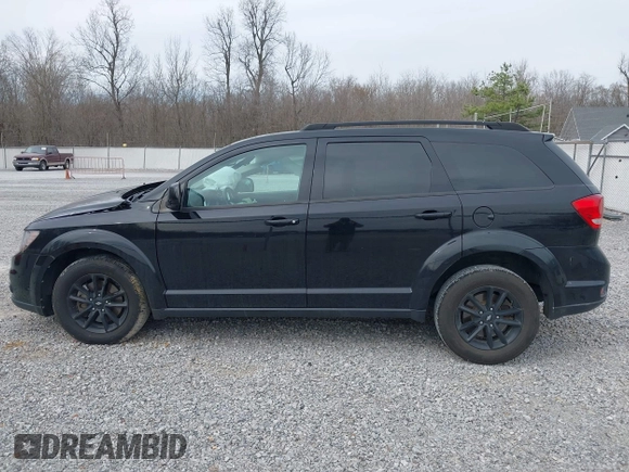 2019 Dodge Journey SE with VIN 3C4PDCBB7KT844691, listed as a IAAI auction lot 41784711 with 107,000 mi miles and . Bid and sale history available at DreamBid. Image 14.