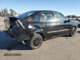2000 Ford Focus LX with VIN 1FAFP33P8YW216936, listed as a Copart auction lot 83038404 with 120,298 mi miles and Salvage Title. Bid and sale history available at DreamBid. Image 3.