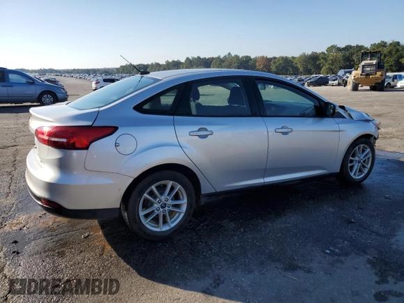 2017 Ford Focus SE with VIN 1FADP3F28HL315779, listed as a Copart auction lot 82608154 with 143,902 mi miles and Salvage title. Bid and sale history available at DreamBid. Image 3.