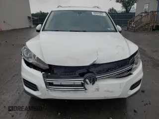 2017 Volkswagen Tiguan Wolfsburg Edition with VIN WVGSV7AX9HW512214, listed as a Copart auction lot 60062865 with 62,667 mi miles and Salvage title. Bid and sale history available at DreamBid. Image 5.