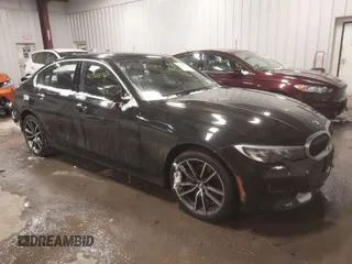 2019 BMW 3 Series 330i xDrive with VIN WBA5R7C56KAJ86102, listed as a IAAI auction lot 41368114 with 89,723 mi miles. Bid and sale history available at carsss.com. Image 1.