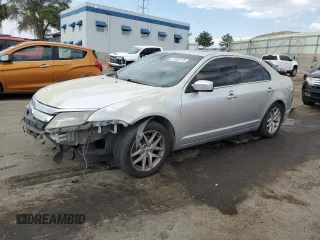 2012 Ford Fusion SEL with VIN 3FAHP0JG7CR257418, listed as a Copart auction lot 61842175 with 167,669 mi miles and Salvage title. Bid and sale history available at DreamBid. Image 1.