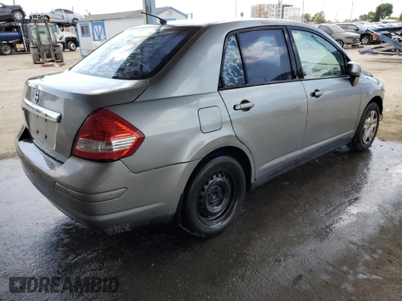 2011 Nissan Versa S with VIN 3N1BC1AP3BL404551, listed as a Copart auction lot 51977085 with 207,070 mi miles and Salvage title. Bid and sale history available at DreamBid. Image 3.