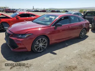 2021 Toyota Avalon Touring z VIN 4T1HZ1FB9MU068508, wystawiony jako Copart lot #58064105 z przebiegiem 8 450 mil mil oraz Szkoda całkowita • Salvage title. Historia ofert i sprzedaży dostępna na DreamBid. Obrazek 1.