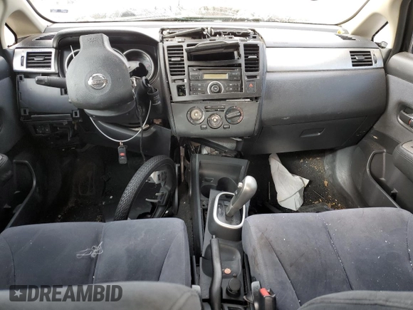 2009 Nissan Versa 1.8 S with VIN 3N1BC11E19L382395, listed as a Copart auction lot 41666375 with 153,899 mi miles and Salvage Title. Bid and sale history available at carsss.com. Image 8.