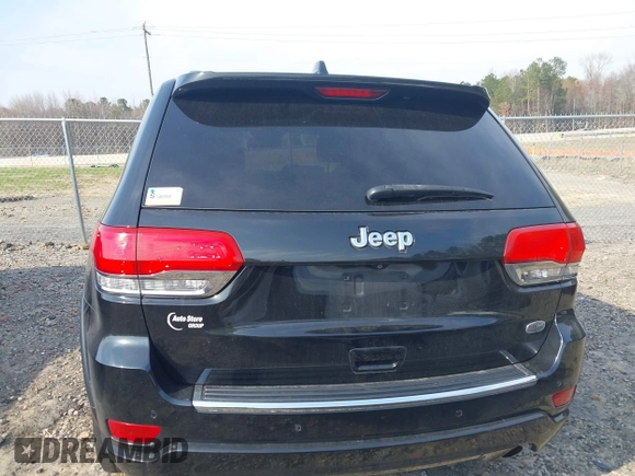 2014 Jeep Grand Cherokee Overland with VIN 1C4RJECG4EC197433, listed as a IAAI auction lot 41769932 with 198,568 mi miles. Bid and sale history available at carsss.com. Image 16.