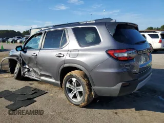 2024 Honda Pilot EX-L 8 Passenger with VIN 5FNYG1H49RB041981, listed as a Copart auction lot 73479824 with 8,758 mi miles and Salvage Title. Bid and sale history available at carsss.com. Image 2.