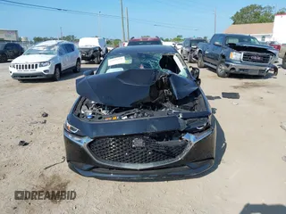 2022 Mazda 3 Carbon Edition с VIN 3MZBPACL2NM310183, выставлен на аукционе IAAI как лот 42297276 с пробегом Не указан миль и . История ставок и продаж доступна на DreamBid. Изображение 11.