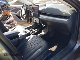 2021 Ford Mustang Mach-E Select with VIN 3FMTK1SS2MMA18591, listed as a IAAI auction lot 42049175 with 32,619 mi miles and . Bid and sale history available at DreamBid. Image 5.
