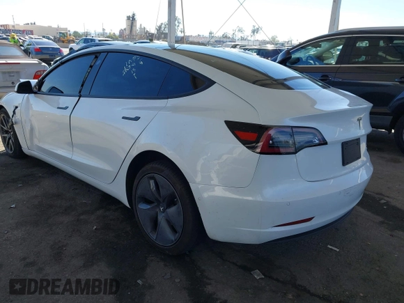 2018 Tesla Model 3 Long Range Battery z VIN 5YJ3E1EB3JF187543, wystawiony jako IAAI lot #41879169 z przebiegiem 74 144 mil mil oraz . Historia ofert i sprzedaży dostępna na DreamBid. Obrazek 3.
