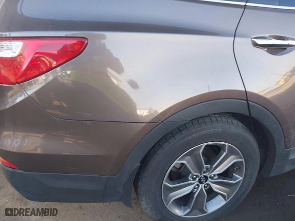 2014 Hyundai Santa Fe Limited with VIN KM8SN4HFXEU069526, listed as a IAAI auction lot 40768034 with 186,650 mi miles. Bid and sale history available at carsss.com. Image 6.