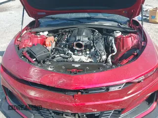 2022 Chevrolet Camaro 2SS z VIN 1G1FG1R71N0123155, wystawiony jako IAAI lot #43255424 z przebiegiem 28 449 mil mil oraz . Historia ofert i sprzedaży dostępna na DreamBid. Obrazek 20.