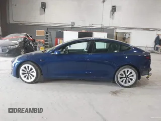 2022 Tesla Model 3 Long Range with VIN 5YJ3E1EB8NF255163, listed as a IAAI auction lot 42105451 with 40,166 mi miles and . Bid and sale history available at DreamBid. Image 14.