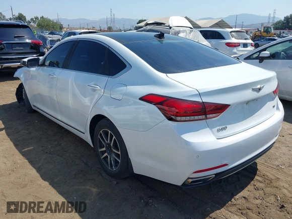 2018 Genesis G80 3.8L z VIN KMHGN4JE1JU225986, wystawiony jako IAAI lot #39921592 z przebiegiem 30 509 mil mil oraz . Historia ofert i sprzedaży dostępna na DreamBid. Obrazek 3.