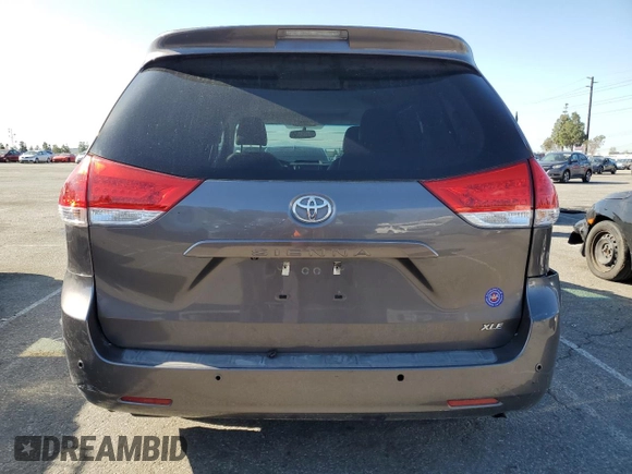 2013 Toyota Sienna XLE AAS with VIN 5TDYK3DC8DS323329, listed as a Copart auction lot 51957005 with 157,638 mi miles and Salvage title. Bid and sale history available at DreamBid. Image 6.