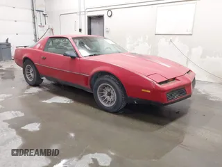 1983 Pontiac Firebird z VIN 1G2AW87H3DN205080, wystawiony jako IAAI lot #41603586 z przebiegiem 83 350 mil mil oraz . Historia ofert i sprzedaży dostępna na DreamBid. Obrazek 1.