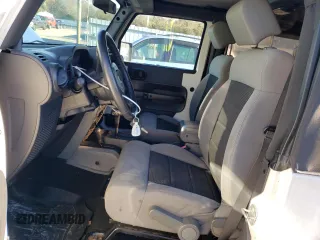 2010 Jeep Wrangler Rubicon with VIN 1J4BA6D17AL132002, listed as a Copart auction lot 83869124 with 183,507 mi miles and Salvage title. Bid and sale history available at DreamBid. Image 7.