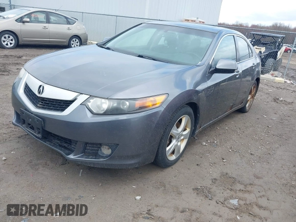 2010 Acura TSX with VIN JH4CU2F60AC015069, listed as a IAAI auction lot 42047083 with 165,671 mi miles. Bid and sale history available at carsss.com. Image 2.