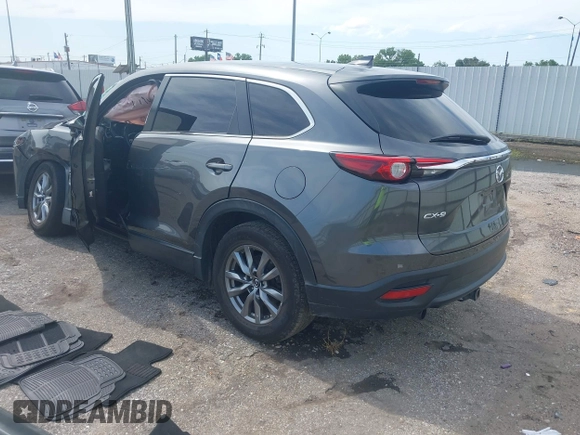 2019 Mazda CX-9 Sport with VIN JM3TCABY0K0327361, listed as a IAAI auction lot 42362232 with 264,699 mi miles and . Bid and sale history available at DreamBid. Image 3.