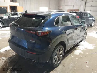 2023 Mazda CX-30 2.5 S Select Package with VIN 3MVDMBBM2PM583968, listed as a IAAI auction lot 41597520 with 32,077 mi miles. Bid and sale history available at carsss.com. Image 4.