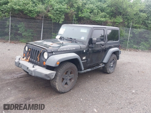 2007 Jeep Wrangler Rubicon with VIN 1J4GA64117L149666, listed as a IAAI auction lot 42252464 with 100,791 mi miles and . Bid and sale history available at DreamBid. Image 2.