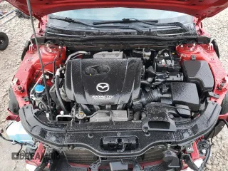 2014 Mazda 3 i SV with VIN JM1BM1T78E1185394, listed as a Copart auction lot 88788315 with 106,915 mi miles and Salvage Title. Bid and sale history available at DreamBid. Image 11.