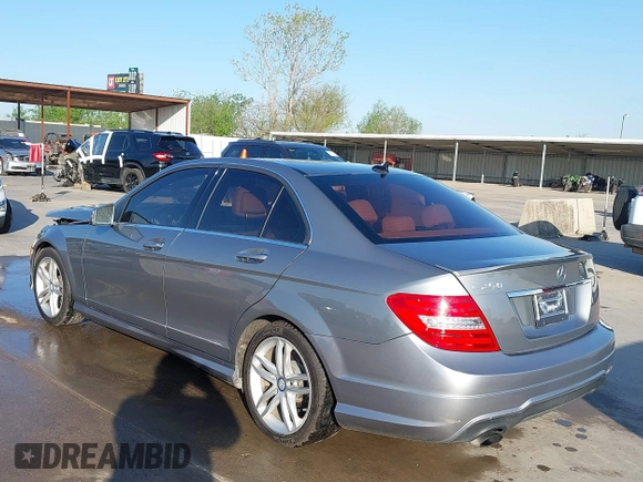2014 Mercedes-Benz C 250 Sport with VIN WDDGF4HB0EG238946, listed as a IAAI auction lot 41973753 with 116,694 mi miles and . Bid and sale history available at DreamBid. Image 3.