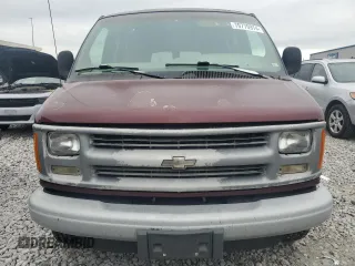 1999 Chevrolet Express with VIN 1GAHG39R5X1151916, listed as a Copart auction lot 79770974 with 132,965 mi miles and Salvage Title. Bid and sale history available at carsss.com. Image 5.
