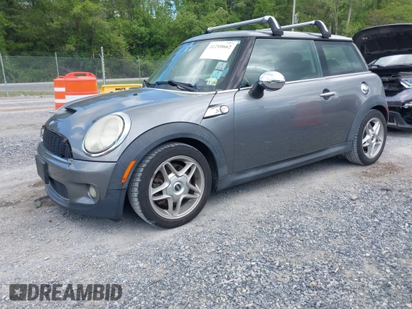 2009 MINI Hardtop S with VIN WMWMF73549TX41034, listed as a IAAI auction lot 42210662 with 108,118 mi miles and . Bid and sale history available at DreamBid. Image 2.