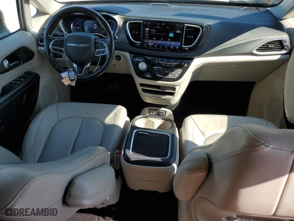 2021 Chrysler Pacifica Hybrid Touring L with VIN 2C4RC1L71MR594686, listed as a Copart auction lot 50885575 with 64,792 mi miles and Clean Title. Bid and sale history available at carsss.com. Image 8.
