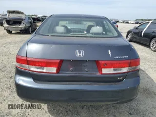 2004 Honda Accord LX z VIN 1HGCM56374A027018, wystawiony jako Copart lot #54768385 z przebiegiem 167 237 mil mil oraz Szkoda całkowita • Salvage title. Historia ofert i sprzedaży dostępna na DreamBid. Obrazek 6.