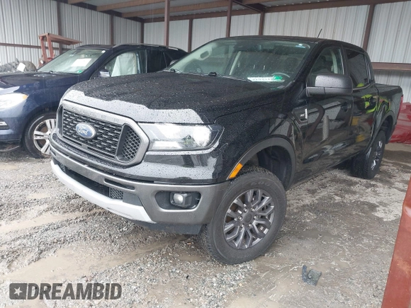 2021 Ford Ranger XL with VIN 1FTER4EH0MLD79815, listed as a IAAI auction lot 41973104 with 127,926 mi miles. Bid and sale history available at carsss.com. Image 2.