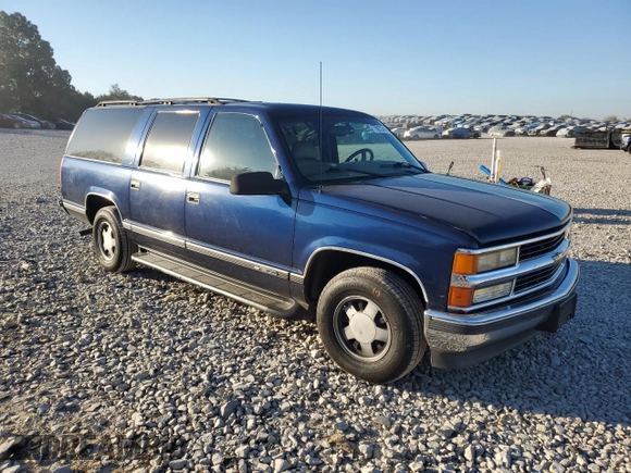 1999 Chevrolet Suburban with VIN 3GNEC16R3XG257322, listed as a Copart auction lot 77601224 with 196,923 mi miles and Salvage Title. Bid and sale history available at carsss.com. Image 4.