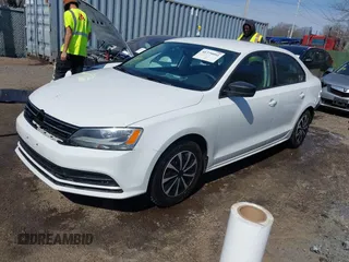 2016 Volkswagen Jetta Sedan 1.4T S w/Technology with VIN 3VW267AJ1GM284752, listed as a IAAI auction lot 41779951 with 164,880 mi miles. Bid and sale history available at carsss.com. Image 2.