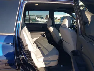 2023 Honda Passport Elite with VIN 5FNYF8H06PB012234, listed as a IAAI auction lot 41208146 with 38,491 mi miles and . Bid and sale history available at DreamBid. Image 8.