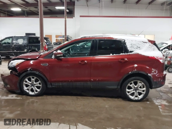 2016 Ford Escape Titanium with VIN 1FMCU9JX6GUB57497, listed as a IAAI auction lot 41375019 with 1 mi miles. Bid and sale history available at carsss.com. Image 14.