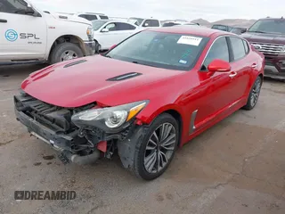 2019 Kia Stinger with VIN KNAE15LA1K6056093, listed as a IAAI auction lot 41620911 with 99,295 mi miles and . Bid and sale history available at DreamBid. Image 2.