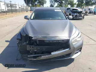 2014 Infiniti Q50 Premium with VIN JN1BV7AP2EM677469, listed as a Copart auction lot 61627125 with 106,670 mi miles and Salvage title. Bid and sale history available at DreamBid. Image 5.