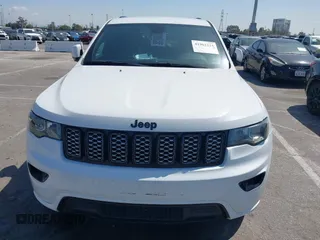 2019 Jeep Grand Cherokee Altitude with VIN 1C4RJEAG8KC832538, listed as a IAAI auction lot 41962224 with 104,321 mi miles and . Bid and sale history available at DreamBid. Image 12.
