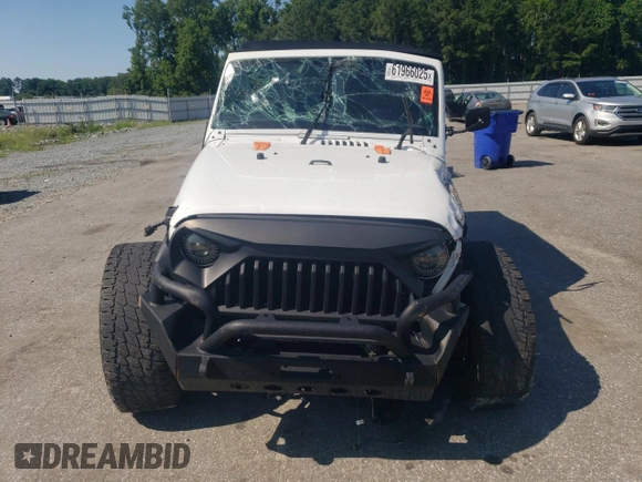 2014 Jeep Wrangler Unlimited Rubicon with VIN 1C4BJWFG4EL325544, listed as a Copart auction lot 61966025 with 149,162 mi miles and Salvage title. Bid and sale history available at DreamBid. Image 5.