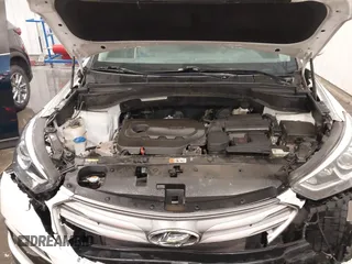 2017 Hyundai Santa Fe 2.4L z VIN 5XYZU3LBXHG444308, wystawiony jako IAAI lot #41685902 z przebiegiem 70 838 mil mil oraz . Historia ofert i sprzedaży dostępna na DreamBid. Obrazek 10.