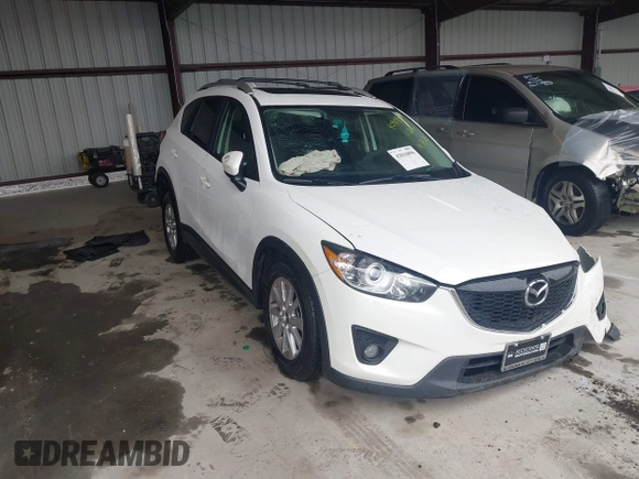2014 Mazda CX-5 Touring with VIN JM3KE4CY9E0370610, listed as a IAAI auction lot 42016896 with 72,340 mi miles. Bid and sale history available at carsss.com. Image 1.