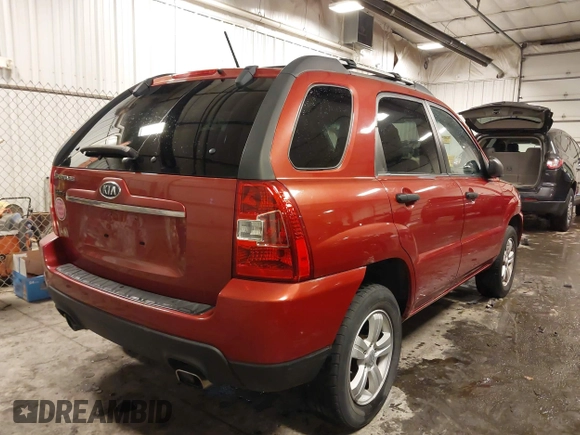 2010 Kia Sportage LX with VIN KNDKG3A40A7727753, listed as a IAAI auction lot 41615255 with 73,869 mi miles and . Bid and sale history available at carsss.com. Image 4.