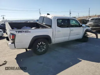 2020 Toyota Tacoma SR5 with VIN 3TMAZ5CN8LM115056, listed as a Copart auction lot 46948805 with 87,713 mi miles and Salvage title. Bid and sale history available at DreamBid. Image 3.