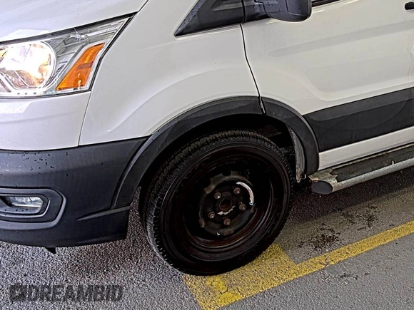 2020 Ford Transit Cargo z VIN 1FTBR1Y89LKA77943, wystawiony jako IAAI lot #42642576 z przebiegiem 144 064 mil mil oraz . Historia ofert i sprzedaży dostępna na DreamBid. Obrazek 37.